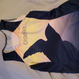 Oiselle blue and yellow team singlet.